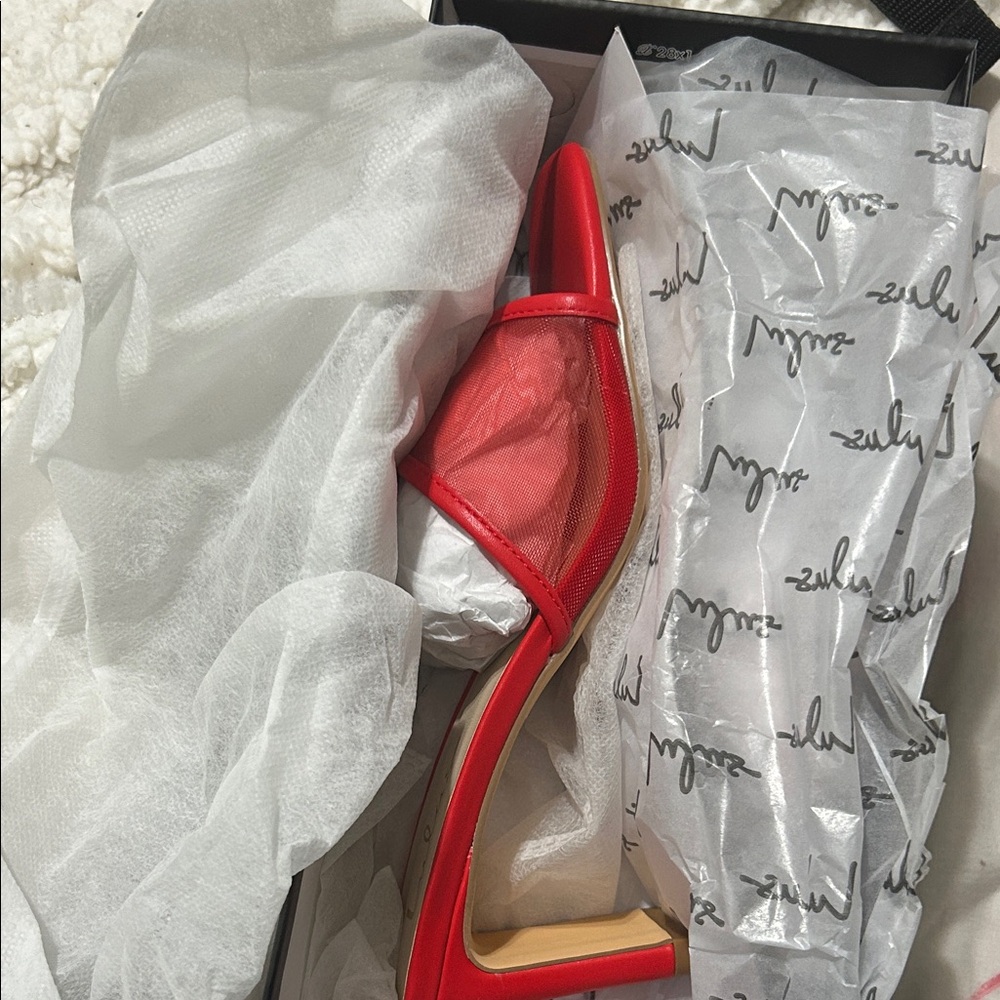 Lulu's Bold Red Heels